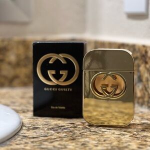 Gucci Gold Metallic Logo Eau de Toilette Bottle
